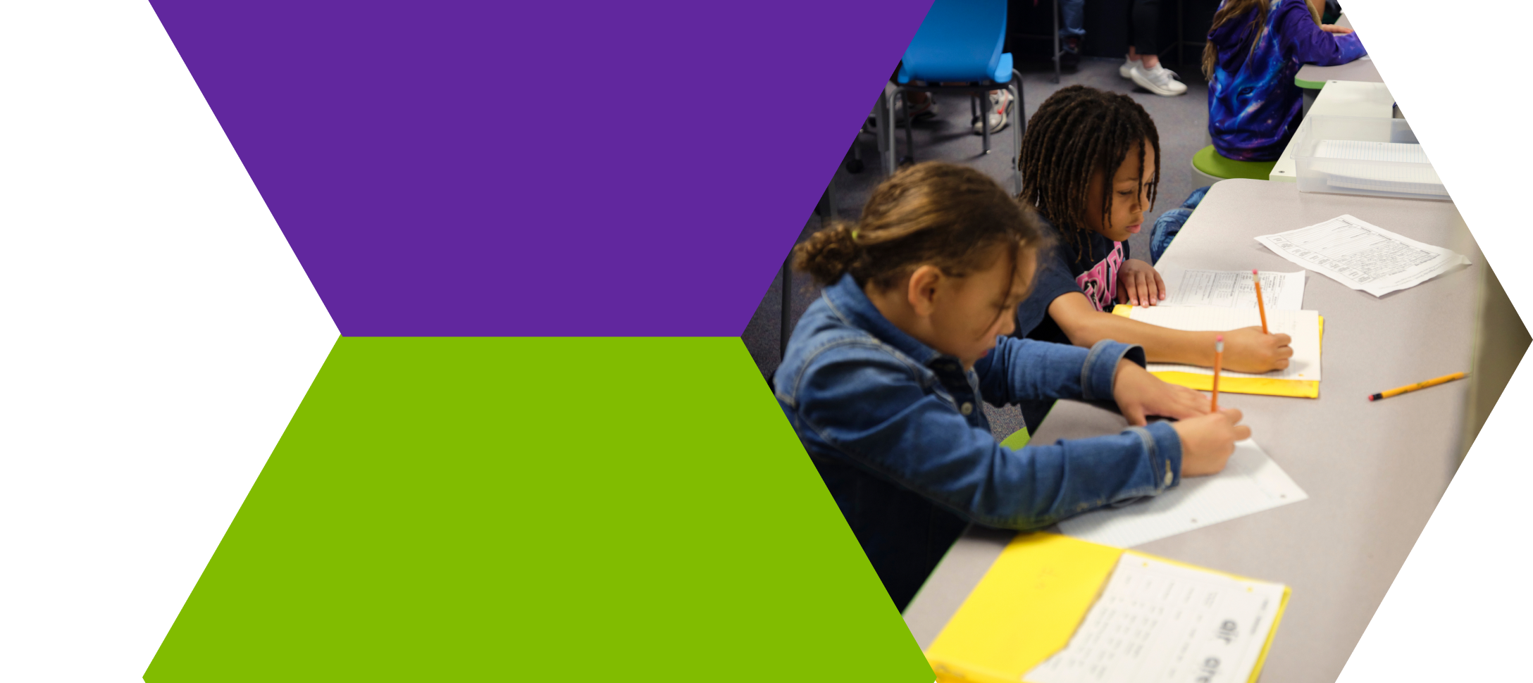 Club members writing and drawing together at a table